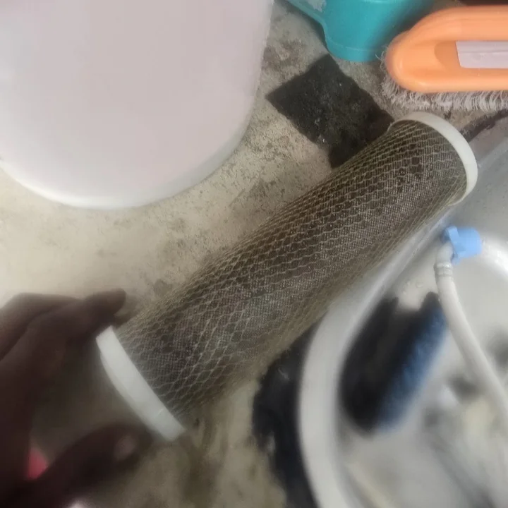 Washing machine inlet hose filter clogged with dirt