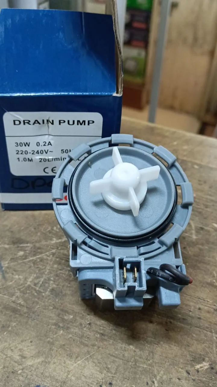 New washing machine drain pump with its box